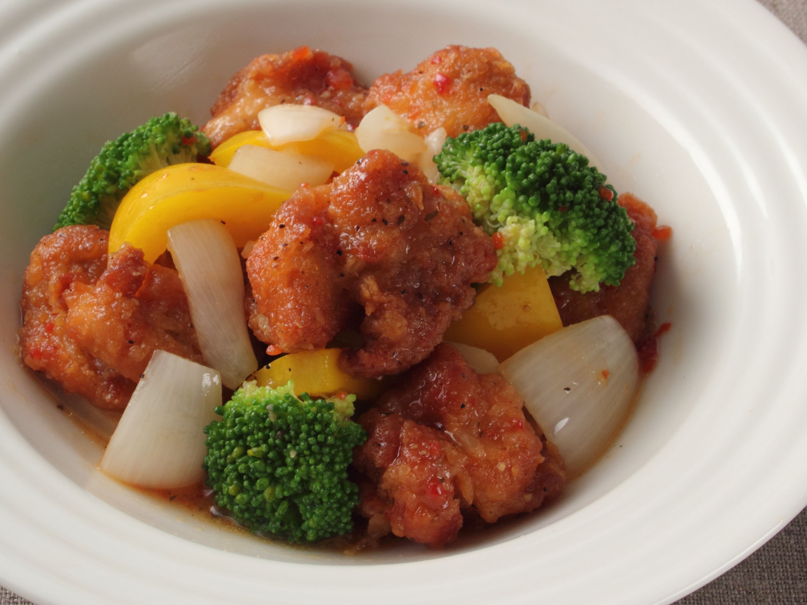 鶏から揚げのトマト炒め