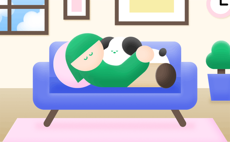 ソファでくつろぐスタッフとわんちゃん
